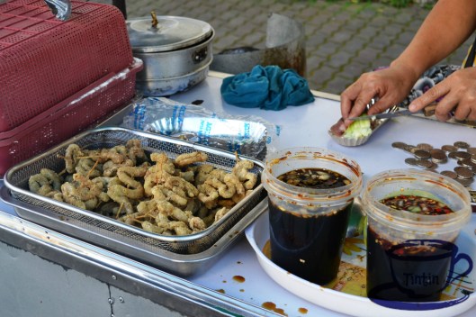 Crispy fried chicken intestines sold at Php2 per stick.